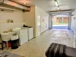 Private tandem 2-car heated garage with in-unit washer and dryer